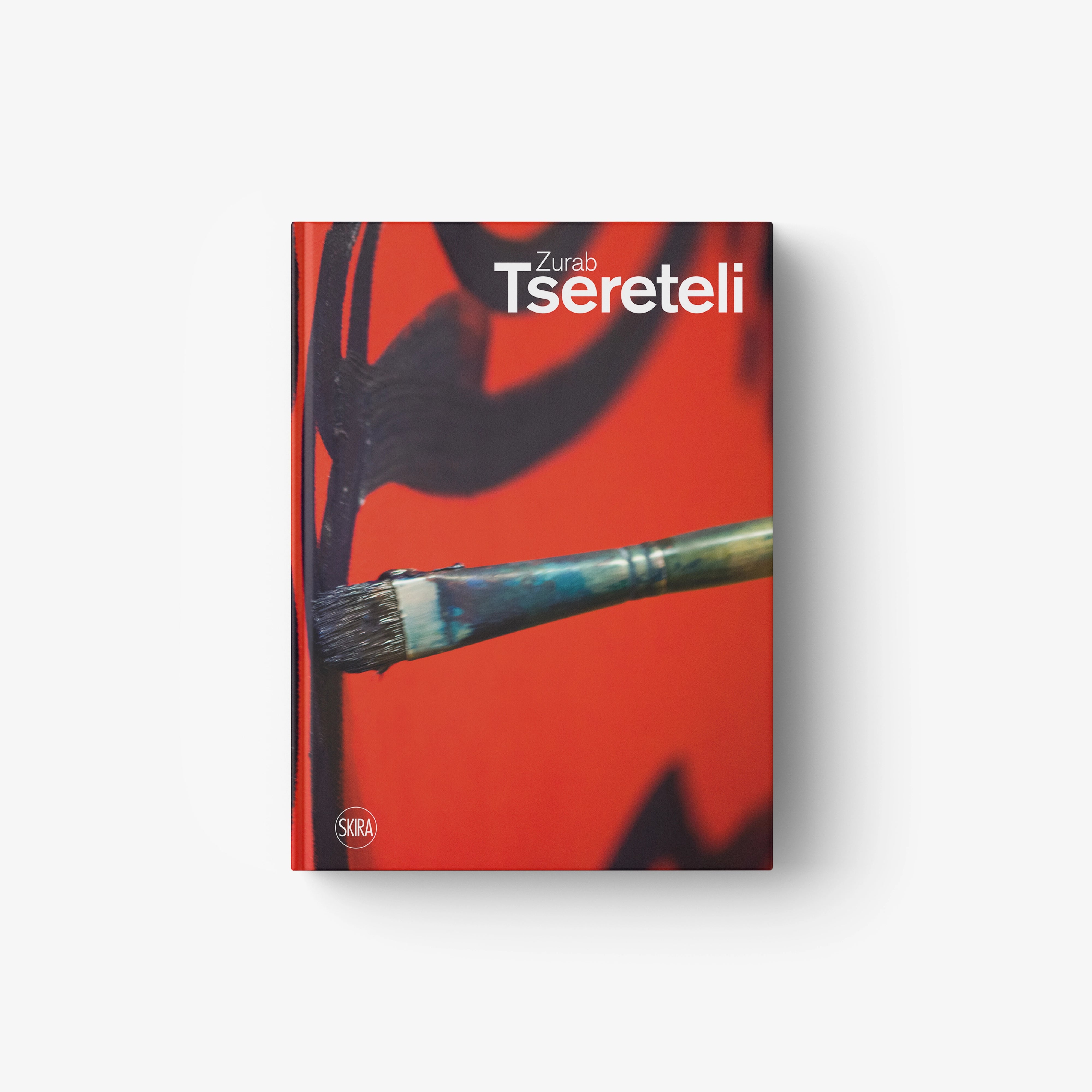 Hardcover art book with red abstract cover art