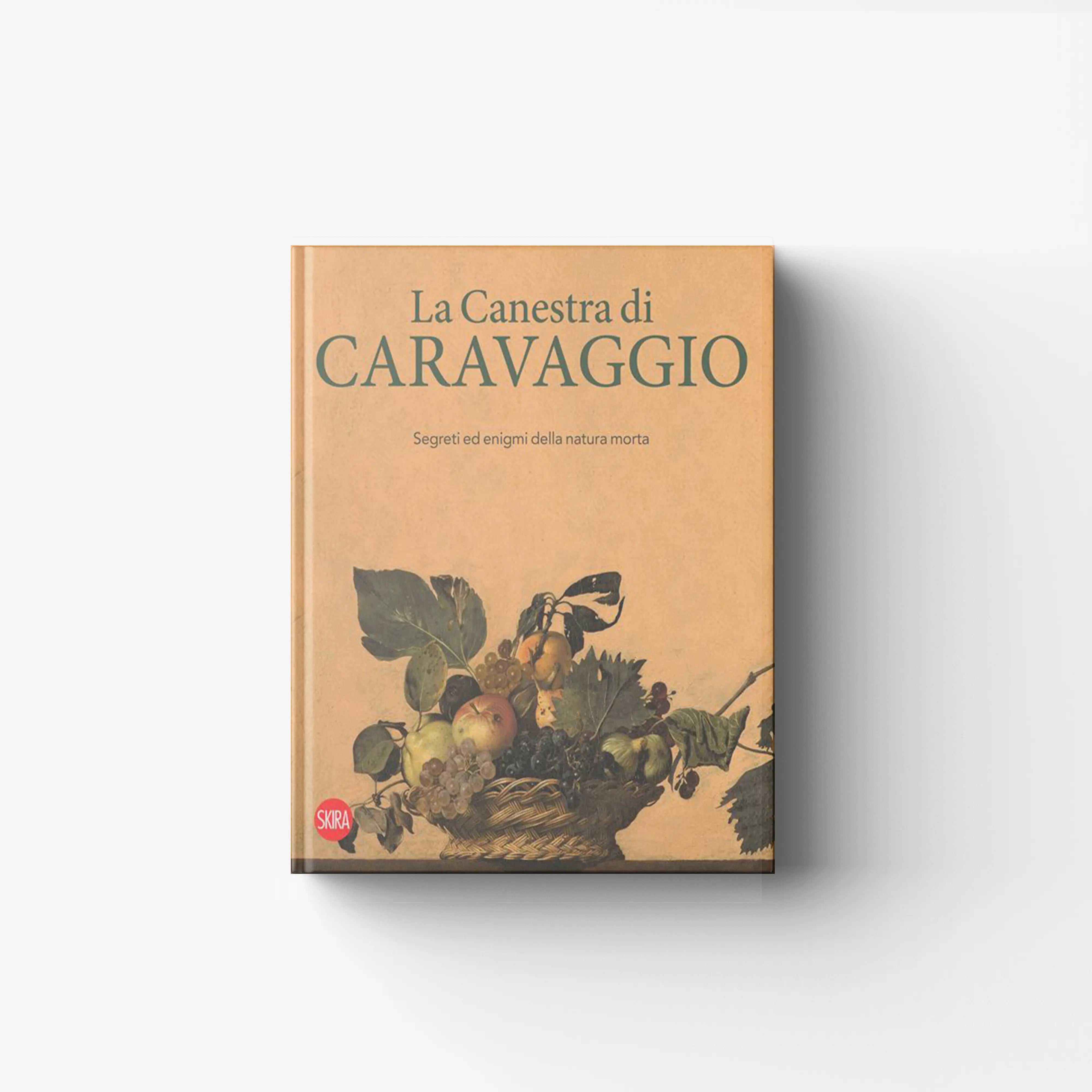 Art book La Canestra di Caravaggio by Skira Arte with fruit still life theme on beige cover