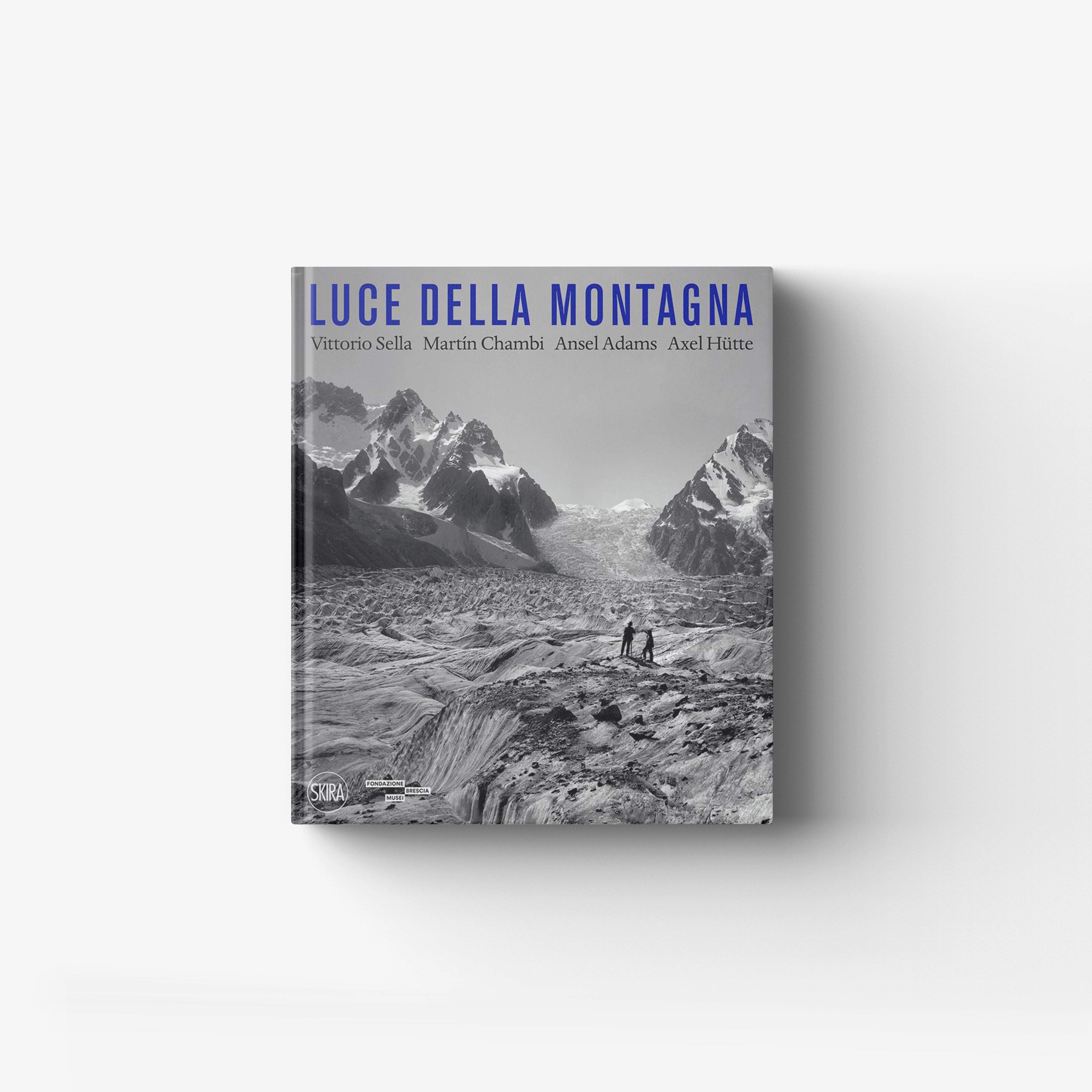 Mountain photography book in black and white and colour by Skira Arte, with Alpine landscape cover