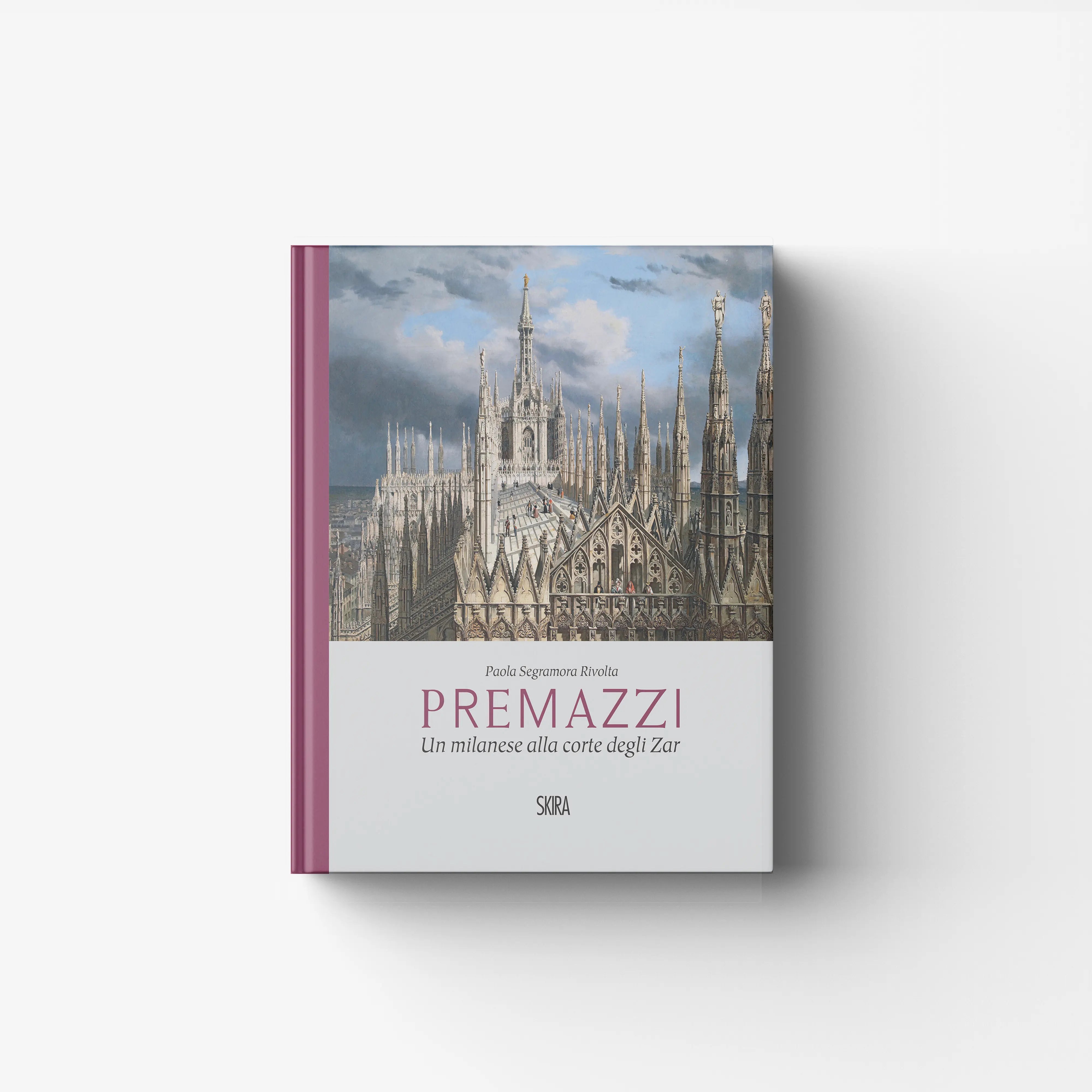 Art book by Skira Arte, Luigi Premazzi, with a pink spine and Milan cathedral skyline illustration